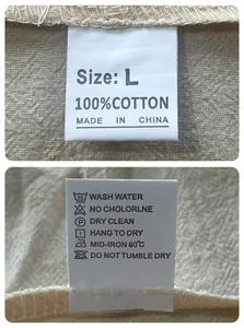 Detail of 100% cotton clothing label with size L and washing care instructions