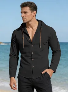 Detail of men's hooded cotton linen shirt with vintage wood buttons and woven drawstrings