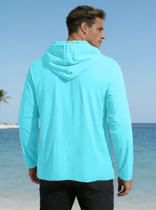Back view of light blue hooded cotton shirt on a tropical beach setting for men
