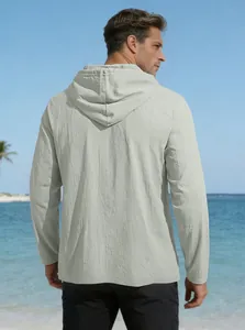 Rear view of a light gray long-sleeve hooded cotton shirt featuring natural linen texture