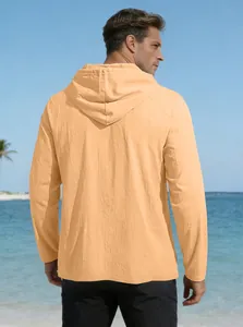 Detail view of the back of a men's lightweight hooded linen shirt in apricot color