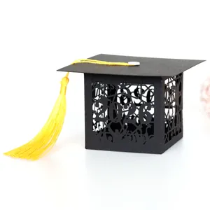 Black 2026 graduation cap gift box with yellow tassel and hollowed paper silhouettes