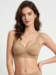 Close-up of seamless V-neck sports bra with ribbed supportive band in nude beige tone
