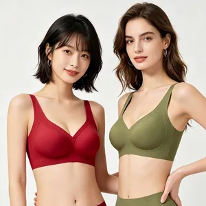 Detail view of seamless V-neck bras in burgundy and olive green with soft support