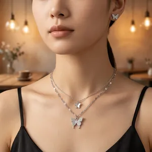 Double-layer silver titanium butterfly necklace set with sparkling zircon crystals