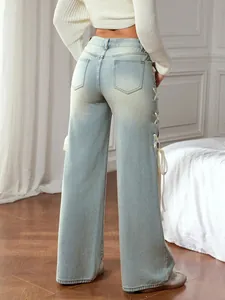 Light blue wide-leg jeans with side ribbon lace-up detail and back pockets for women