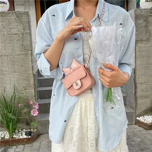Pink quilted crossbody bag for girls with sweet bow and floral metal lock detail