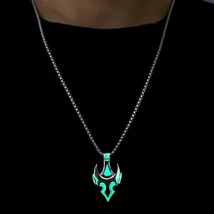 Luminous bull head helmet pendant necklace with green glow on black background