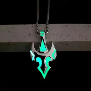 Close-up of a tribal bull head pendant necklace with glowing green luminous effect