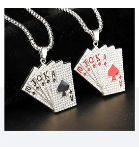 Macro detail of iced-out royal flush poker pendant with crystal rhinestones on box chain