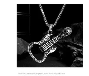 Macro shot of punk skull guitar pendant necklace with functional bottle opener detail