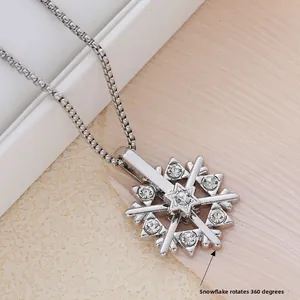Rotating snowflake pendant necklace with silver box chain and sparkling zircons