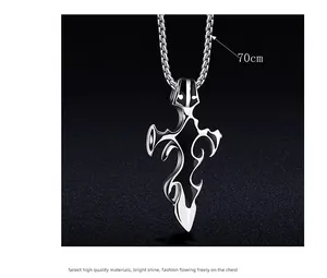 Detail of 70cm wheat chain and silver gothic cross pendant with black enamel inlay