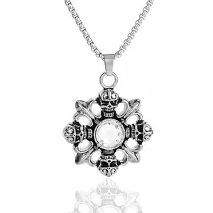 Close-up of gothic skull pendant necklace with central clear rhinestone and box chain