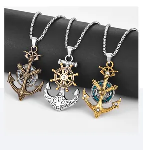 Detailed view of nautical anchor and helm pendants in bronze, silver, and gold finishes