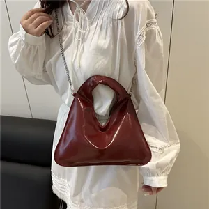 Minimalist wine red patent leather geometric handbag with stylish silver chain strap