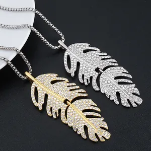 Elegant Bohemian feather pendant necklaces with crystals in gold and silver finishes