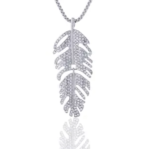 Elegant silver leaf pendant necklace with pavé crystal wings on a slim box chain