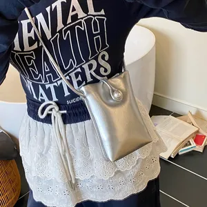 Mini silver metallic crossbody phone bag with pearl buckle and slim shoulder strap