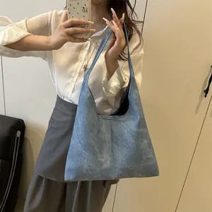 Minimalist large blue tote bag for women with vintage washed texture for casual daily use
