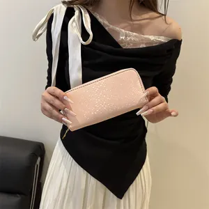 Chic pink snakeskin texture long wallet with gold zipper, stylish clutch for women
