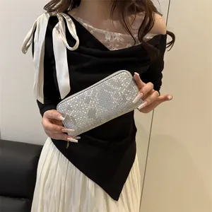 Fashionable snakeskin pattern long wallet in silver-grey with a secure zipper closure