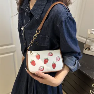 Fashionable shoulder bag with strawberry print and gold metal chain strap for women