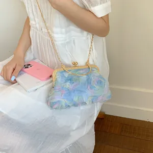 Elegant 3D floral evening handbag in light blue with gold chain and top handle