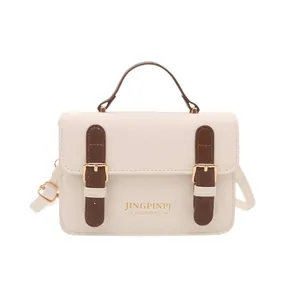 Borsa a tracolla chic bianco crema e marrone con design vintage a doppia fibbia