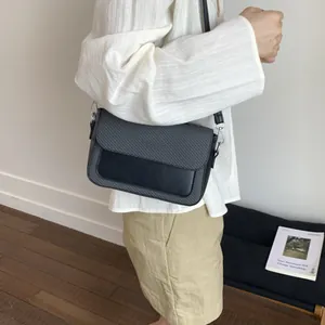 Minimalist grey and black contrast small square handbag with silver metal buckles