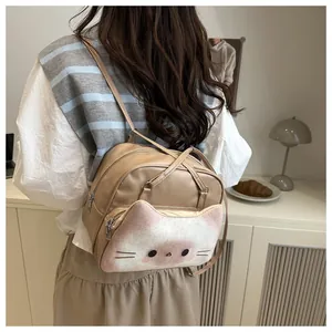 Detail of bread cat tote bag with pink gradient plush kitten face and soft PU texture