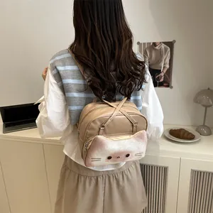 Cute beige cat-shaped backpack with soft plush pocket and stylish PU leather texture