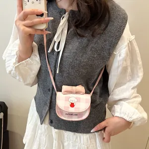 Mini sac à bandoulière à carreaux roses avec chien mignon et nœud sur chemisier blanc