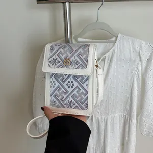 New Chinese-style crossbody mini bag with floral embroidery and gold clover metal buckle