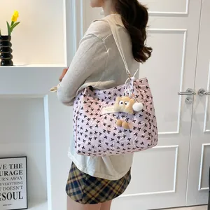 Pink large capacity tote bag with black bow prints and plush pendant for summer fashion