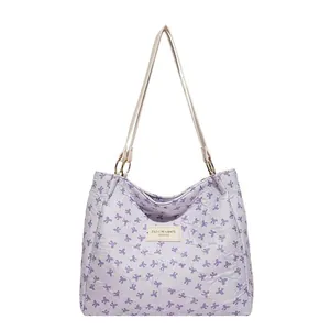 Purple large capacity tote bag with bow pattern and white leather shoulder straps