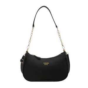 Large capacity black crescent hobo bag with lychee texture and gold chain strap
