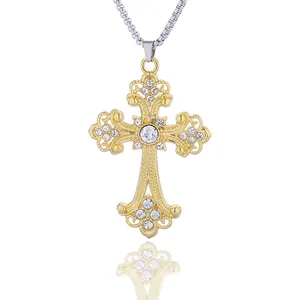 Vintage gold baroque cross pendant with rhinestones on a silver box chain