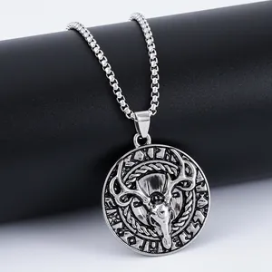 Vintage silver stag skull necklace with runic symbols on a round viking style pendant