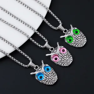 Retro punk owl pendant necklace set with blue, pink and green evil eye gemstones