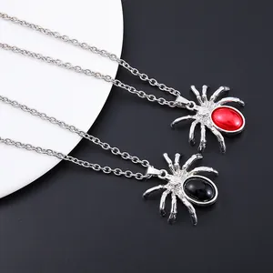 Gothic spider pendant necklace with red and black crystals on silver metal chain