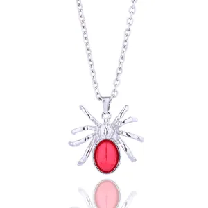 Gothic spider pendant necklace with red gemstone and silver chain for women