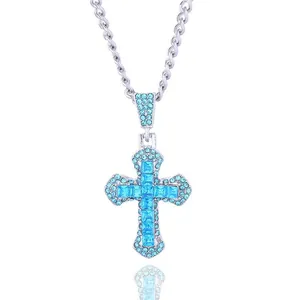 Hip hop silver necklace with cross pendant featuring vibrant light blue pavé crystals