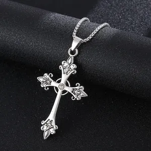 Gothic silver fleur-de-lis cross necklace with center zircon on a wheat chain