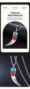 Detail of vintage wolf tooth pendant with turquoise inlay and stainless steel chain