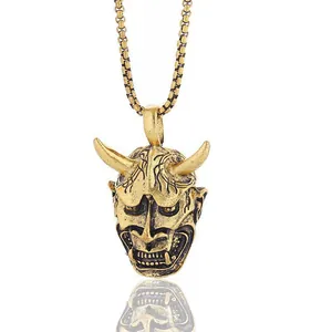Vintage gold demon hannya mask pendant necklace with horn details and metal chain