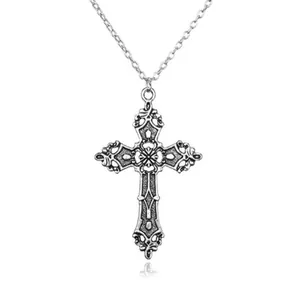 Vintage silver cross necklace with intricate floral patterns and gothic relief design
