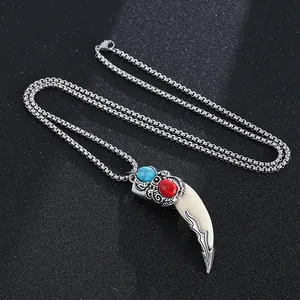 Retro wolf tooth pendant necklace in stainless steel with colorful gemstone inlay details