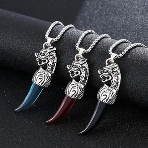 Vintage stainless steel wolf tooth pendant necklace for men in blue, red, and black styles