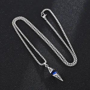 Retro stainless steel star pendant necklace with deep blue crystal on black background